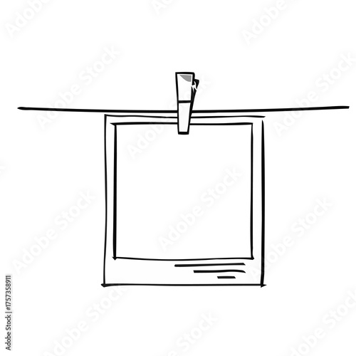 Hand-drawn sketch of a blank instant photo frame clipped to a wire, perfect for creative projects and memories