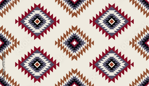 Seamless geometric ethnic pattern inspired by Native American tribal fabric. Traditional Aztec and Navajo style carpet and tile vector design on navy  background. Perfect for textile, wrapping,