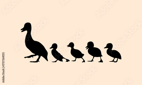 silhouettes of mother duck and ducklings