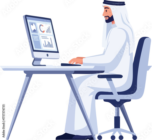Arab man working on computer at desk.