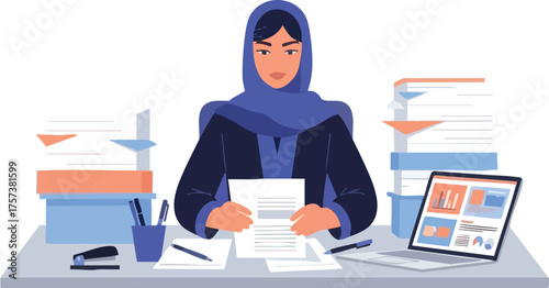 Professional Muslim woman in a blue hijab working at her desk with documents and a laptop.