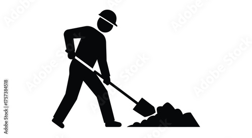 Silhouetted construction worker in hard hat diligently shoveling a pile of dirt and debris with a robust shovel. silhouette