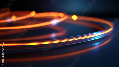 Neon light trails create mesmerizing spiral pattern on reflective surface, evoking sense of motion and energy