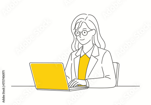 young woman working on her laptop at a desk, smiling with success