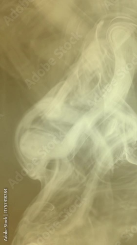 Smoke effect video on gold background with elegant swirling motion high quality videos and video footage for cinematic overlays and visual designs