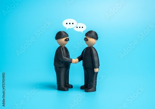 Photography Two robbers agree to cooperate