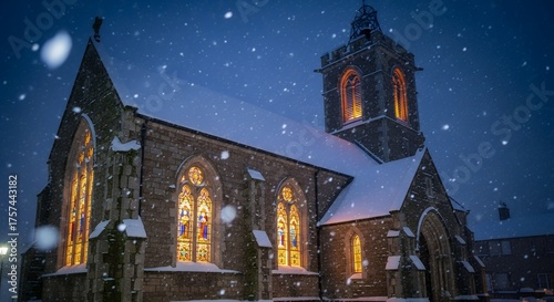 Old stone church covered in snow with glowing stained glass windows during Christmas Eve night, warm lights inside contrasting cold winter air