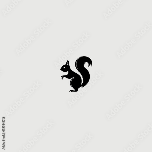 Stylized black squirrel silhouette vector icon on a neutral background, minimal wildlife graphic design element