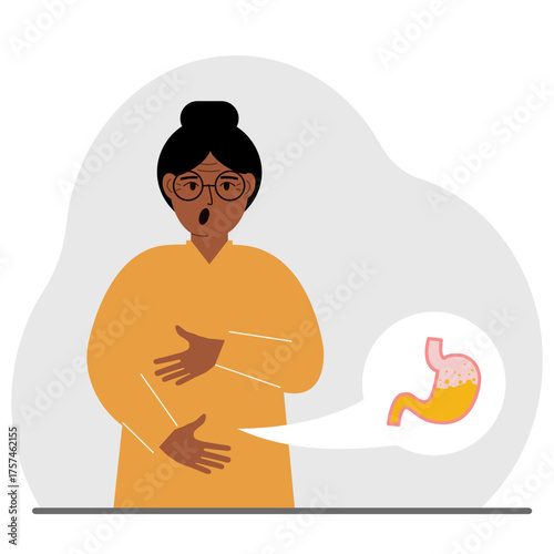 The concept of pain in the abdomen. The woman holds his stomach with both hands. Problems with the stomach or digestion.