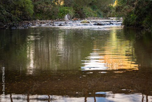 A pastoral, autumn HDR image of the River Massan flowing through Glen Massan on its way to Holy Loch, Argyll and Bute, Scotland.