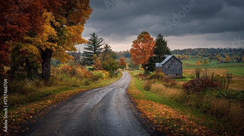 Autumn Road Leading to Rustic Barn Under Dramatic Sky, Vermont Landscape