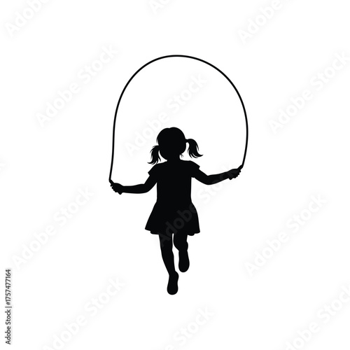 Child jumping rope silhouette