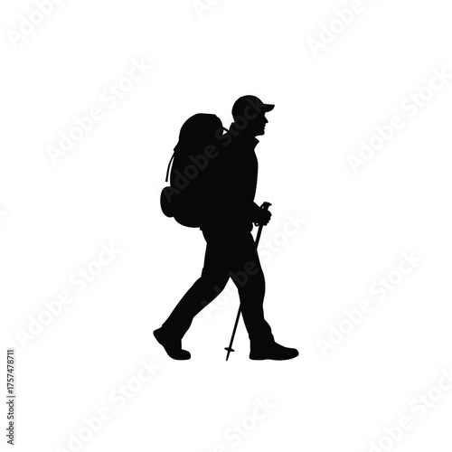 Man with backpack and trekking poles silhouette
