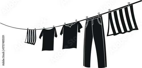 Black clothes drying on a clothesline outdoors