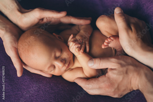 A newborn baby is wrapped in diapers with a wool cap in a basket. Swaddling, maternity hospital, family, ivf, life planning, parenting. A mother's love for her child. Baby food. High quality photo
