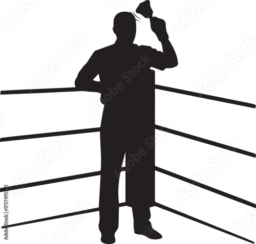 Boxing referee silhouette stands in ring holding up fist celebrating victory or announcing match