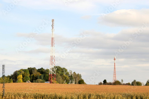 Cell towers are installed outside the city in a wheat field.
