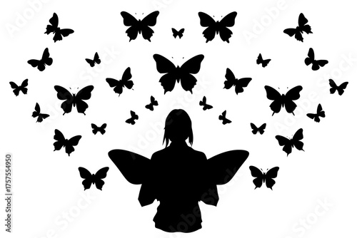 Silhouette of woman with butterfly wings surrounded by flying butterflies