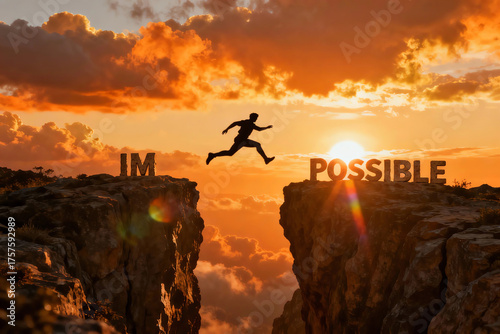 Silhouette man jumping cliff gap from 'IM' to 'POSSIBLE' under dramatic golden sunset sky, symbolizing overcoming challenges and achieving goals.
