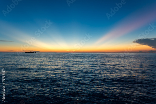 Sunset in the Gulf of Tomini, on the Togian Islands, off the coast of Central Sulawesi in Indonesia.  The Togian Islands are a paradise for divers and snorkelers.