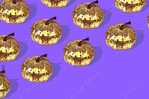 Disco pumpkin pattern on purple violet background. Party concept. 