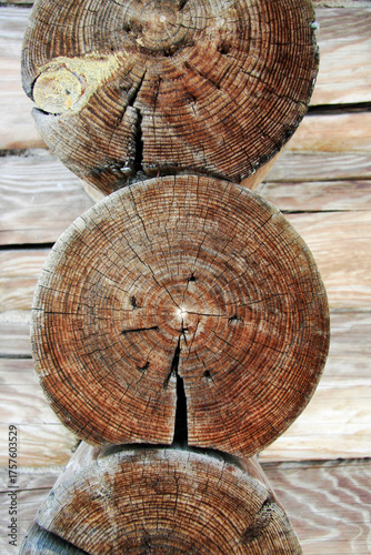 Cut of three logs in the structure of a wooden house in a Russian village
