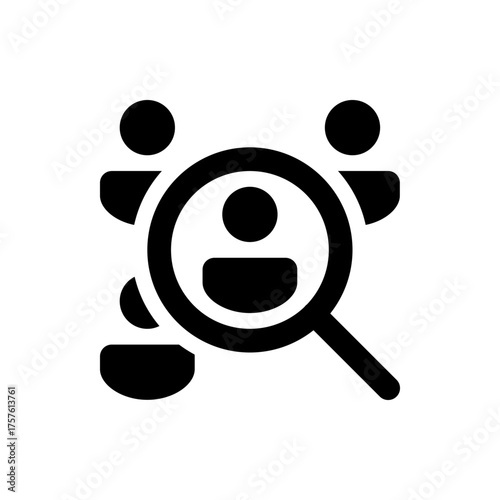 A black and white icon showing a magnifying glass focusing on a person within a group of people icons