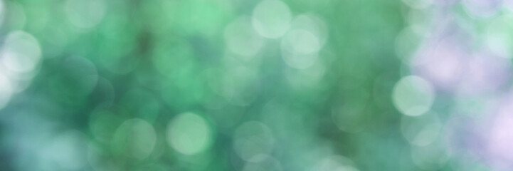 Fototapete Krankenhaus Grüner Bokeh-Schimmer mit weichen Lichtkreisen  © elenavolf