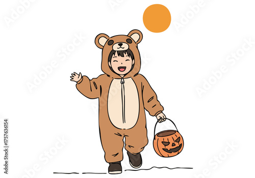 A cute toddler dressed as a bear enjoys Halloween, collecting treats in a pumpkin bucket. A playful scene with a spooky backdrop. Perfect for autumn and holiday themes.