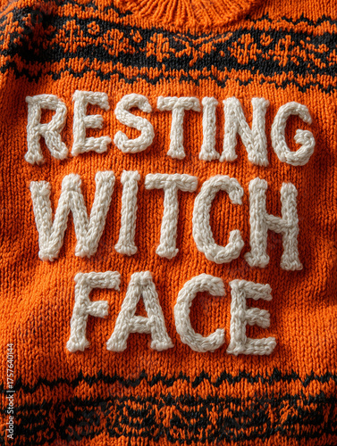 A knitted sweater design that says Resting Witch Face - close up of fuzzy letters on an ugly halloween sweater.