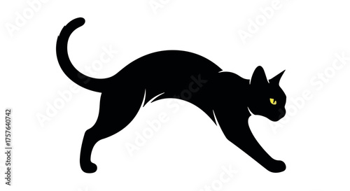 Sleek black cat with piercing yellow eyes stalking gracefully on a clean white background.