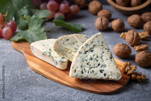 Bild auf Leinwand Sliced blue cheese - Roquefort cheese or gorgonzola cheese