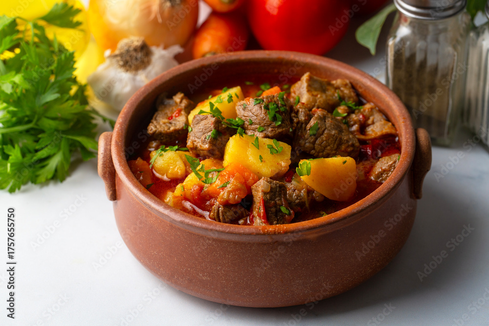 Φωτογραφία Beef goulash, soup and a stew, made of beef chuck steak, potatoes and plenty of paprika