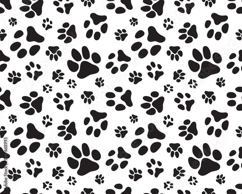 Black silhouettes of prints of dog paws, Seamless pattern	
