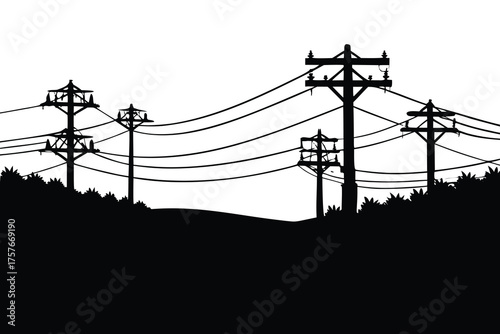Silhouette of a row of wooden electricity poles with power lines stretching across a dark landscape
