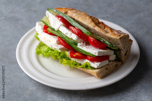 A cold sandwich made with w...