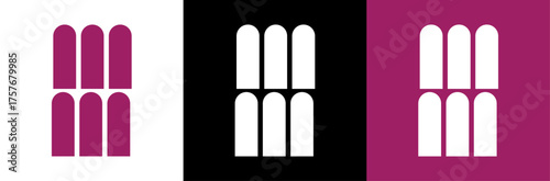 A stone wall of an old medieval castle holds a set of cutlery with an open door letting in light