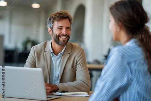 Smiling Business Meeting in a Modern Office During the Day