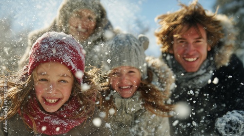 Family Enjoying a Snowy Day Outdoors With Laughter and Joy in Winter Weather