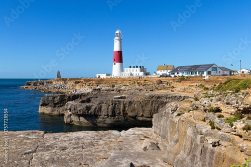 Red and white painted Portland Bill Lighthouse on the Isle of Portland, just south of Weymouth in the county of Dorset, UK

