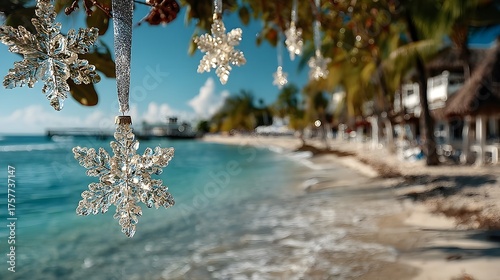 Fototapeta Naklejka Na Ścianę i Meble -  Beach with a Christmas tree decoration hanging from a tree. The tree is decorated with snowflakes and is hanging over the water