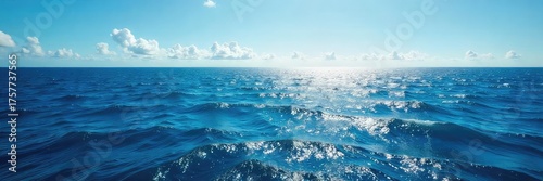 Vast, deep blue ocean stretching to the horizon, sunlight reflecting on the waves, creating a mesmerizing seascape Perfect for travel, nature, and serenity themes , environment, calm