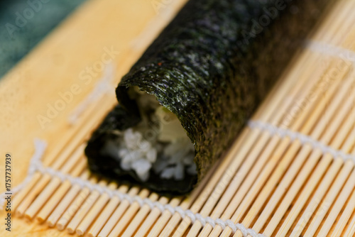 Cream Cheese Sushi Roll On Bamboo Mat Close-Up Of 