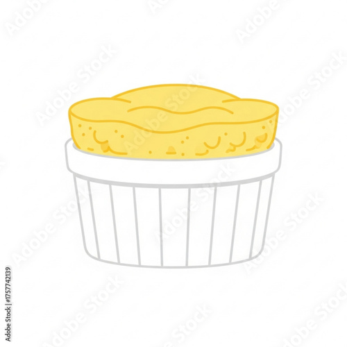 Lemon souffle dessert in a ramekin on a plain background  