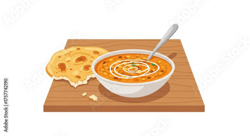 Lentil dal soup with bread on wooden table  