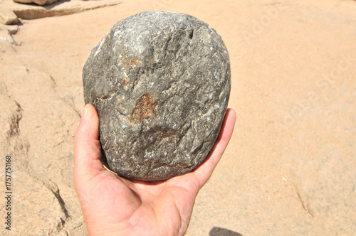 Stone balls of doleryt volcanic rock for chipping tool of granite processing in the Aswan Red Granite Quarry, Egypt