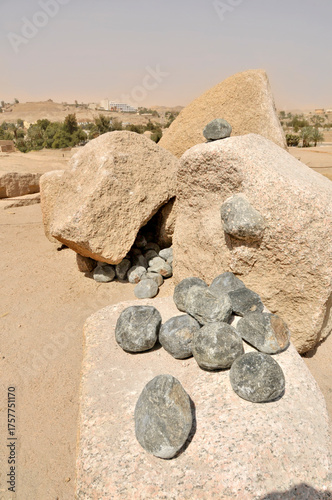 Stone balls of doleryt volcanic rock for chipping tool of granite processing in the Aswan Red Granite Quarry, Egypt