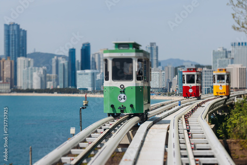 Cuadro en lienzo Haeundae Blue Line Park, Busan, ride on multicoloured sky capsule train, railway