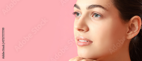 Young woman doing face buil...
