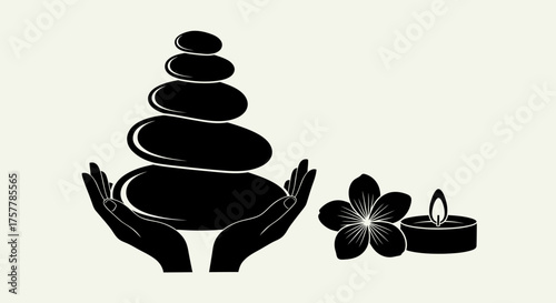 Stacked smooth stones held by hands, beside a flower and lit candle